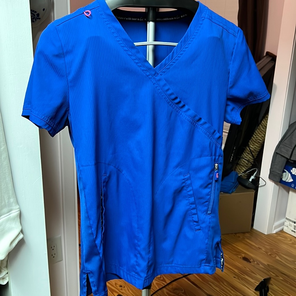 Galaxy blue scrubs (too and bottom sold together as a set)